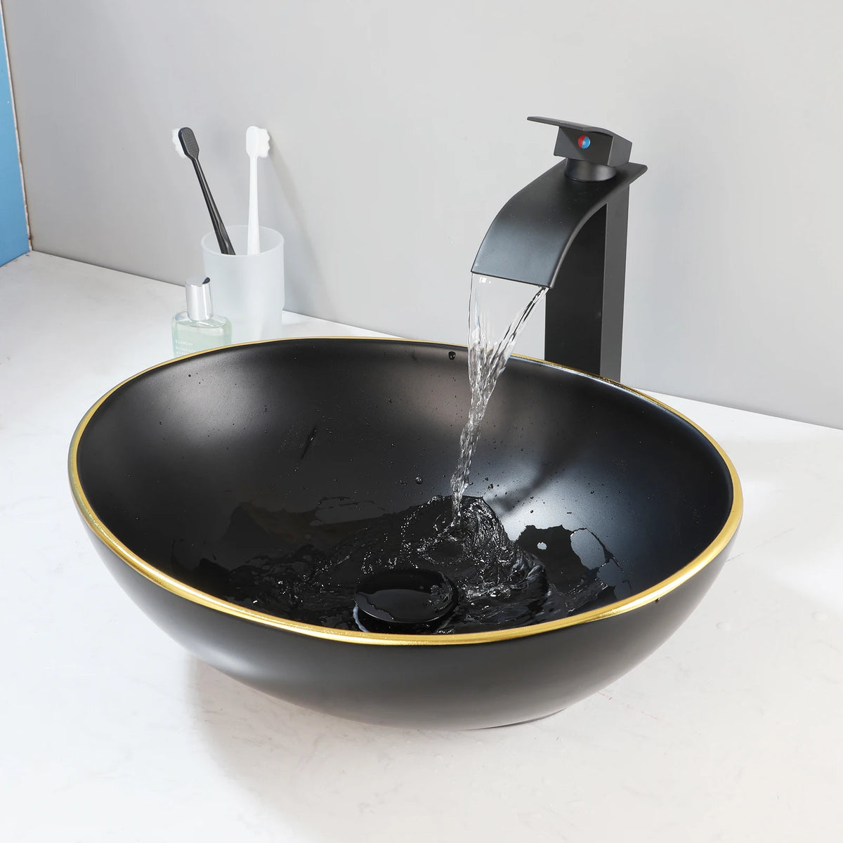 Mekkhalo Oval Vessel Sink With Waterfall Faucet Above Counter Ceramic