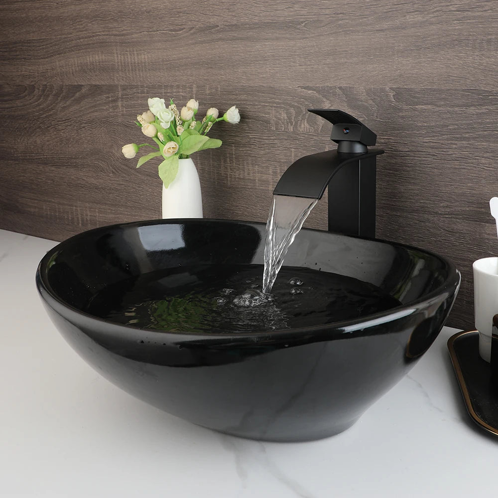 Mekkhalo Oval Vessel Sink With Waterfall Faucet Above Counter Ceramic