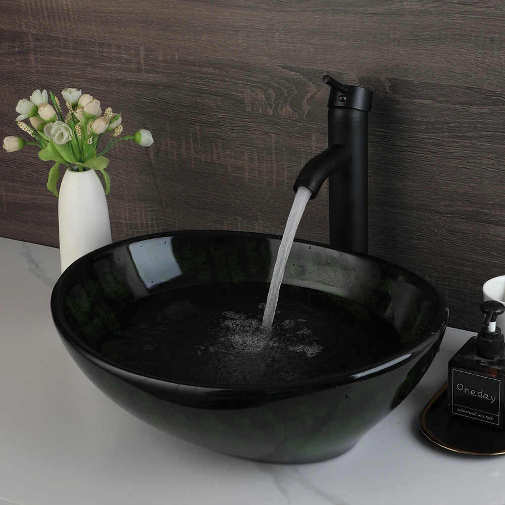 Mekkhalo Oval Vessel Sink With Waterfall Faucet Above Counter Ceramic